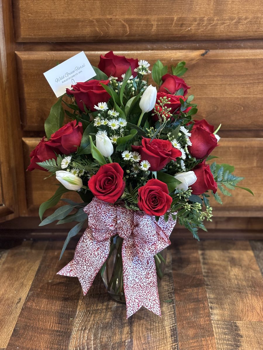 Deluxe Dozen - Red roses with eucalyptus and mixed greenery