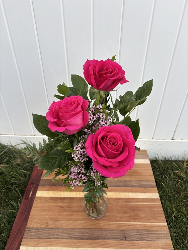 Deluxe Sympathy Rose Vase - Three elegant pink roses with waxflower
